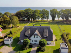 Reethus am Strand - Haushälfte 1 mit Kamin, Sauna, Middelhagen